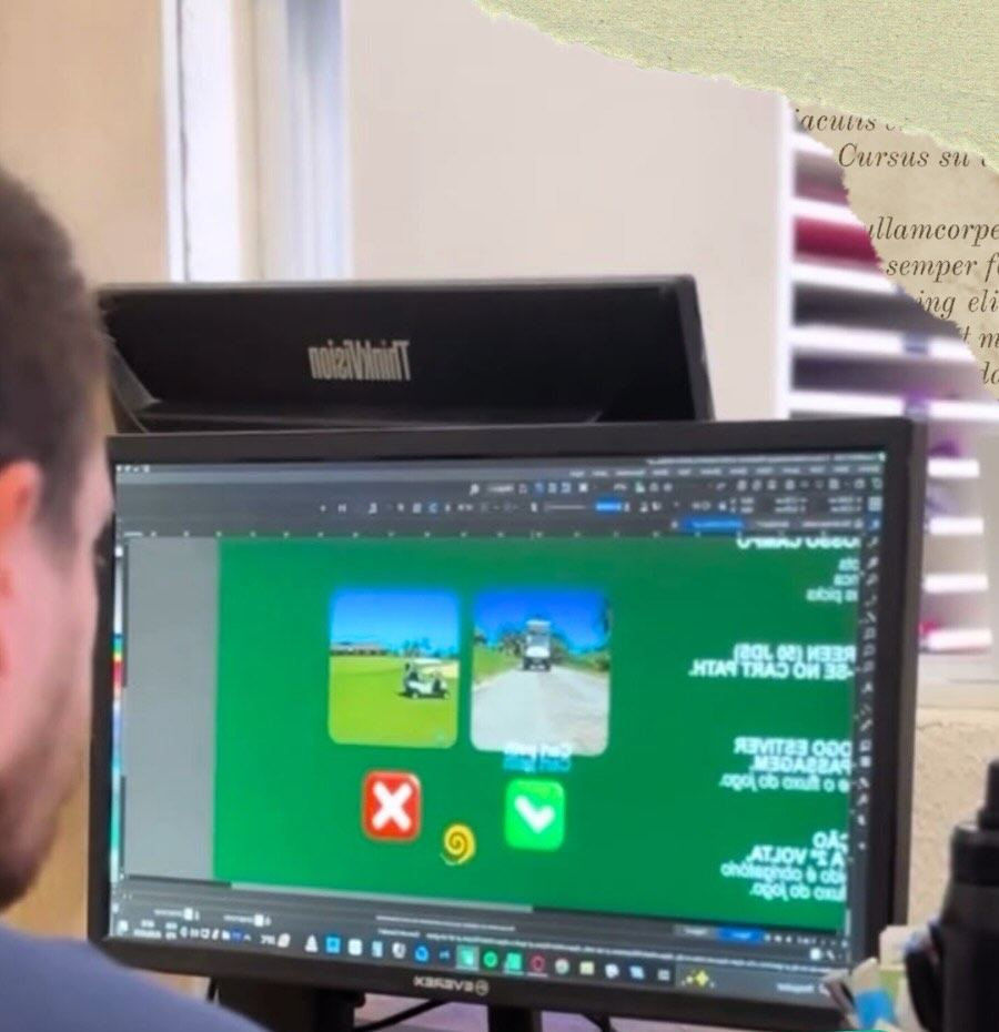 Equipe da Paperini desenhando uma arte na tela do computador